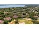 Aerial view showing home's location within a community by the lake at 23 Camino Real Blvd # 23, Howey In The Hills, FL 34737