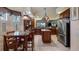 Well-equipped kitchen with granite countertops and stainless steel appliances at 23 Camino Real Blvd # 23, Howey In The Hills, FL 34737