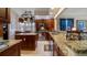 Well-equipped kitchen with granite countertops and stainless steel appliances at 23 Camino Real Blvd # 23, Howey In The Hills, FL 34737