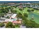 Community overview showing clubhouse, pool, and golf course at 1405 W Schwartz Blvd, The Villages, FL 32159