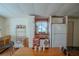 Kitchen area with white cabinets, and a butcher block kitchen island at 1306 Westland Dr, Tavares, FL 32778