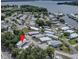 Aerial view showing home's waterfront location at 1306 Westland Dr, Tavares, FL 32778