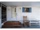Porch with rocking chairs and wooden steps at 1306 Westland Dr, Tavares, FL 32778