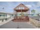 Community gazebo with seating and picnic tables at 1306 Westland Dr, Tavares, FL 32778