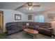 Spacious living room with sectional sofa and coffee table at 1306 Westland Dr, Tavares, FL 32778