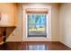 Kitchen window offers a picturesque view of the tranquil landscape outside at 601 W Old Hwy 441 # 11B, Mount Dora, FL 32757