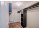 Well-organized walk-in closet with built-in shelving and hanging rod at 601 W Old Hwy 441 # 11B, Mount Dora, FL 32757