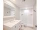 Modern bathroom with a large walk-in shower and white subway tile at 601 W Old Hwy 441 # 11B, Mount Dora, FL 32757