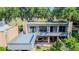 Condo building showcasing a private balcony and lush greenery at 601 W Old Hwy 441 # 11B, Mount Dora, FL 32757
