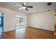 Bright Gathering room with wood floors and sliding doors to the pool at 3460 Laurel Dr, Mount Dora, FL 32757