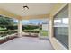 Relaxing screened porch overlooking backyard at 5072 Neptune Cir, Oxford, FL 34484