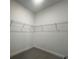 Spacious closet with wire shelving for convenient storage at 2003 Sunshine Peak Dr, Minneola, FL 34715