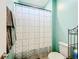 Small bathroom with shower and toilet at 172 Seville Dr, Davenport, FL 33837