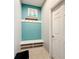 Inviting entryway with built-in bench and storage at 172 Seville Dr, Davenport, FL 33837