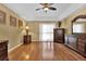Main bedroom with hardwood floors and large windows at 13144 Coldwater Loop, Clermont, FL 34711