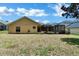 House with large backyard, and screened patio at 13144 Coldwater Loop, Clermont, FL 34711