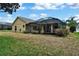 House with large backyard and screened patio at 13144 Coldwater Loop, Clermont, FL 34711