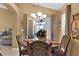 Elegant dining room with a charming table and chairs at 13144 Coldwater Loop, Clermont, FL 34711
