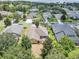 Aerial view showcasing home and surrounding neighborhood at 13144 Coldwater Loop, Clermont, FL 34711