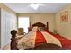Spacious bedroom with a comfortable bed and neutral color palette at 13144 Coldwater Loop, Clermont, FL 34711