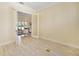 Home office with hardwood floors and view to living room at 6514 Crews Lake Crest Loop, Lakeland, FL 33813
