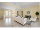 Spacious living room with hardwood floors and access to backyard at 6514 Crews Lake Crest Loop, Lakeland, FL 33813