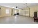 Bright and clean garage with automatic door opener and extra storage at 6514 Crews Lake Crest Loop, Lakeland, FL 33813