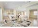 Open concept living room with kitchen view and hardwood floors at 6514 Crews Lake Crest Loop, Lakeland, FL 33813