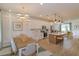 Open floorplan showcasing kitchen island and dining area at 13249 Peaceful Melody Dr, Winter Garden, FL 34787