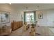Light and airy living room with neutral decor and wood floors at 13249 Peaceful Melody Dr, Winter Garden, FL 34787