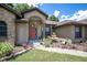 Attractive entryway with fountain and landscaping at 3011 Indian Trl, Eustis, FL 32726