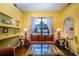 Living room with hardwood floors and built-in shelving at 3011 Indian Trl, Eustis, FL 32726