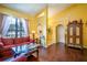 Comfortable living room with hardwood floors and large windows at 3011 Indian Trl, Eustis, FL 32726