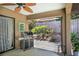 Covered patio with built-in grill and access to backyard at 3011 Indian Trl, Eustis, FL 32726