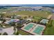 Aerial view of tennis courts and community green space at 184 Bayou Bend Rd, Groveland, FL 34736