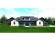 Stunning two-story farmhouse with stone and blue siding, welcoming front porch at 10739 Fiesta St, Clermont, FL 34711