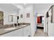 Modern bathroom with double vanity and a walk-in shower at 4189 Paragraph Dr, Kissimmee, FL 34746