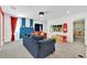 Fun game room features themed walls and comfortable seating at 4189 Paragraph Dr, Kissimmee, FL 34746