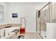 Modern bathroom with soaking tub, shower, and stylish decor at 4189 Paragraph Dr, Kissimmee, FL 34746