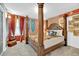 Spacious bedroom with a four-poster bed and themed decor at 4189 Paragraph Dr, Kissimmee, FL 34746