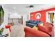Game room with Mario theme and comfy seating at 4189 Paragraph Dr, Kissimmee, FL 34746