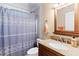 Bathroom with shower/tub combo and vanity at 12270 Virginia Dr, Leesburg, FL 34788