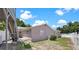 House exterior with wooden paneling and deck at 12270 Virginia Dr, Leesburg, FL 34788
