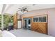 Covered patio with grill and exterior access at 12270 Virginia Dr, Leesburg, FL 34788