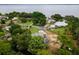 Aerial view of waterfront property, showcasing houses and canals at 12270 Virginia Dr, Leesburg, FL 34788