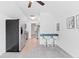 Modern kitchen with stainless steel appliances and breakfast bar at 12270 Virginia Dr, Leesburg, FL 34788
