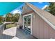 Upstairs deck with a view of the surrounding area at 12270 Virginia Dr, Leesburg, FL 34788