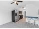Modern kitchen with stainless steel appliances and dark brown cabinets at 12270 Virginia Dr, Leesburg, FL 34788