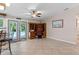 Home office with built-in shelves and view of the pool at 12270 Virginia Dr, Leesburg, FL 34788