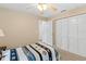 Bedroom with a double bed and large closet at 12270 Virginia Dr, Leesburg, FL 34788